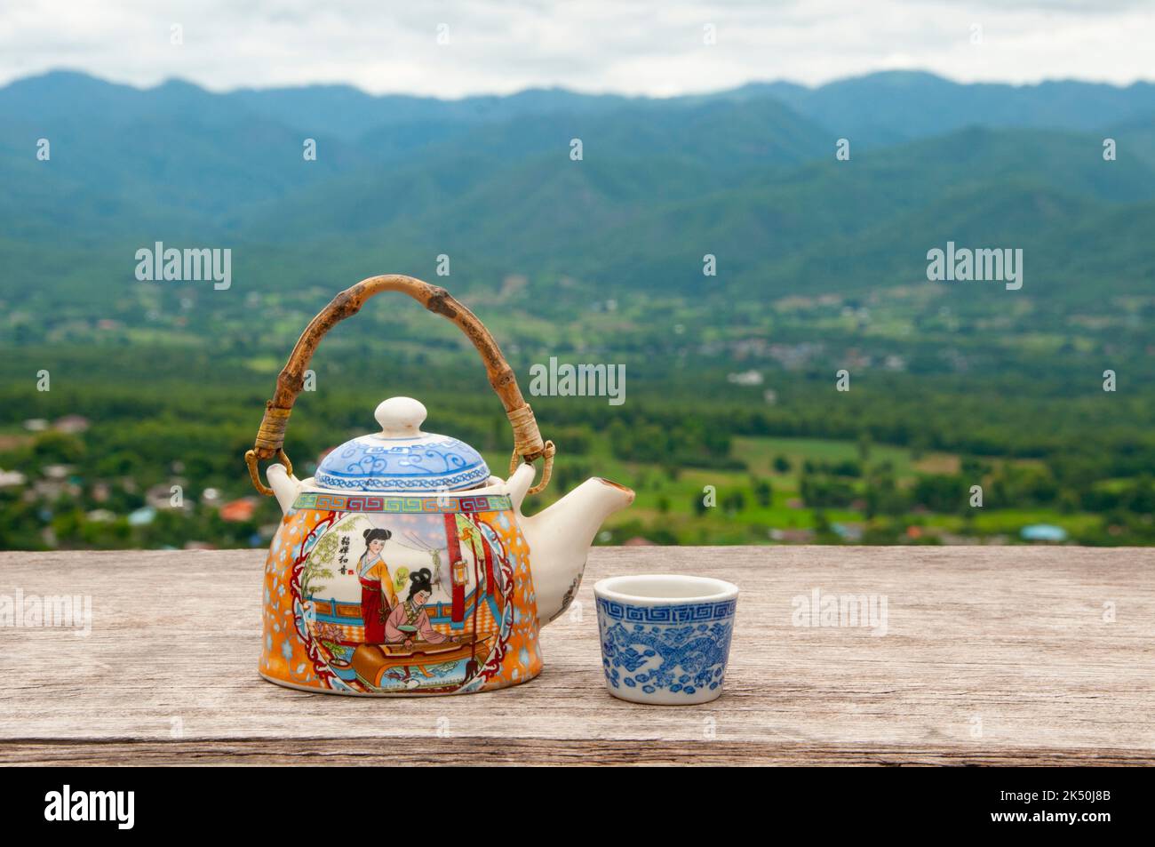Thailand: A pot of locally grown Chinese green tea, Yun Lai Viewpoint, Pai, northern Thailand. According to oral tradition, tea has been grown in China for more than four millennia. The earliest written accounts of tea making, however, date from around 350 CE, when it first became a drink at the imperial court. Stock Photo