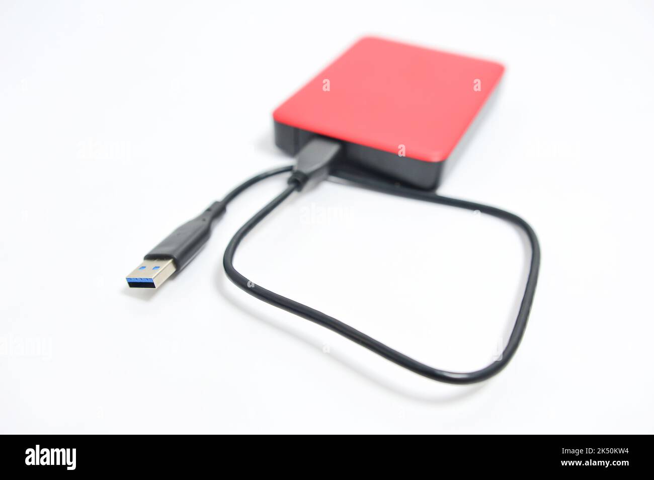 Isolated external hard drive or hard disk or HDD on white background. Stock Photo