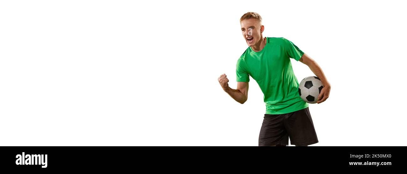 Goal. Excited football player shouting, expressing win emotions isolated over white background. Sport, win, victory, champion and success concept Stock Photo