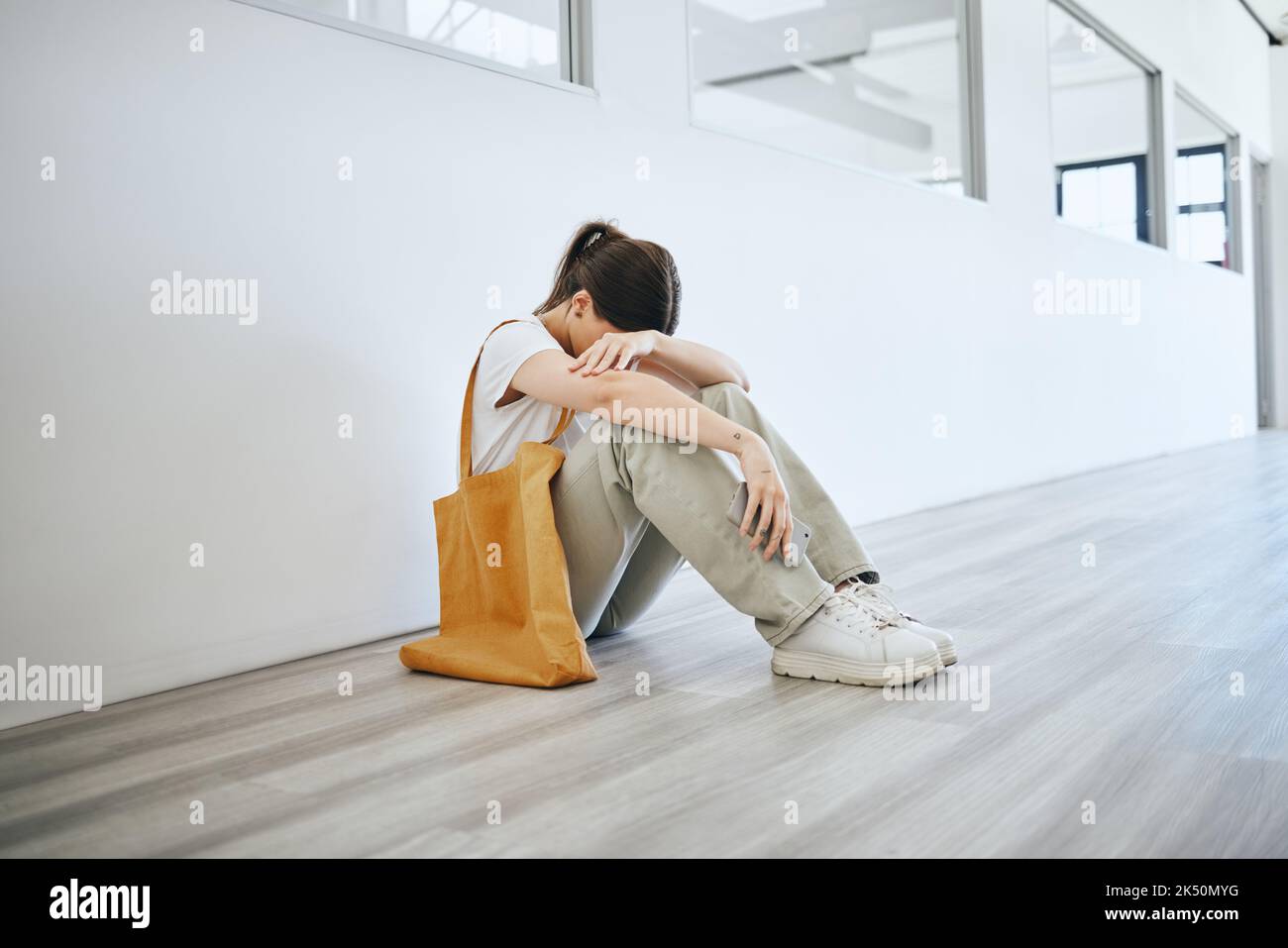 Hopeless person sitting on floor hi-res stock photography and images ...
