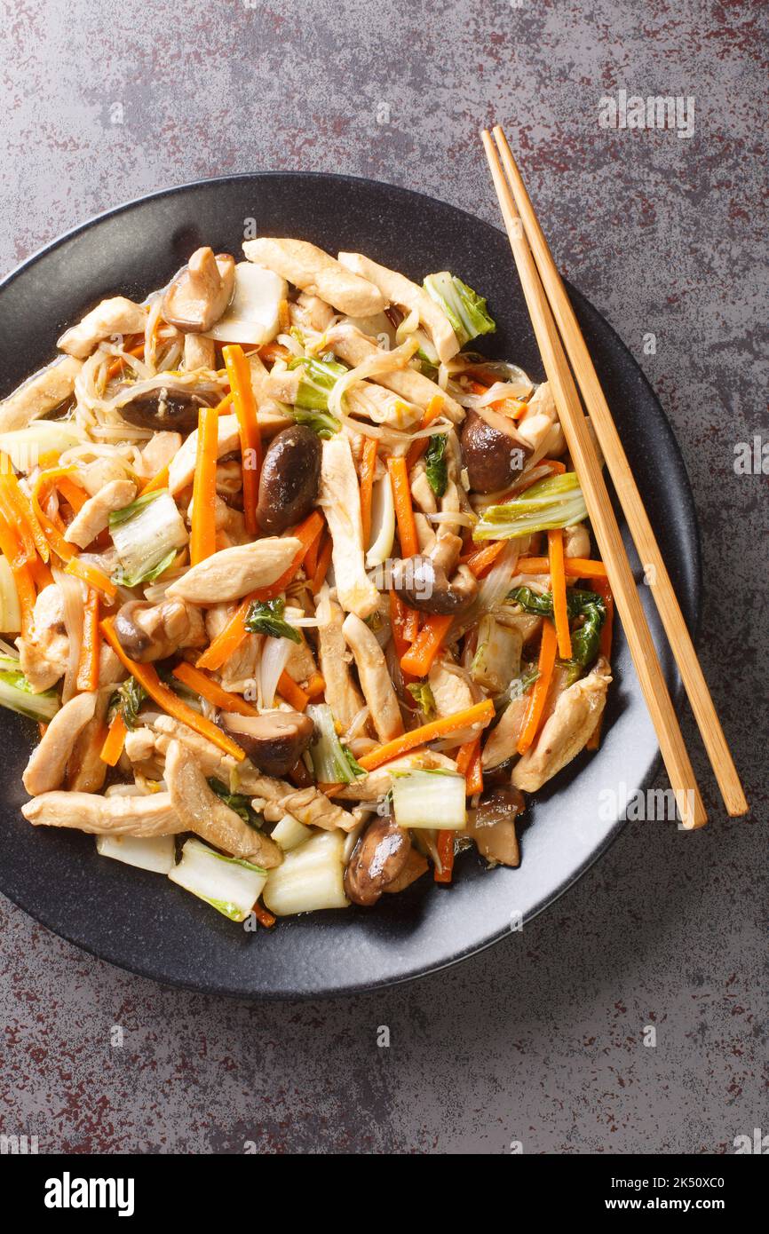Chop Suey Chicken Stir Fry with vegetables closeup in a plate on the