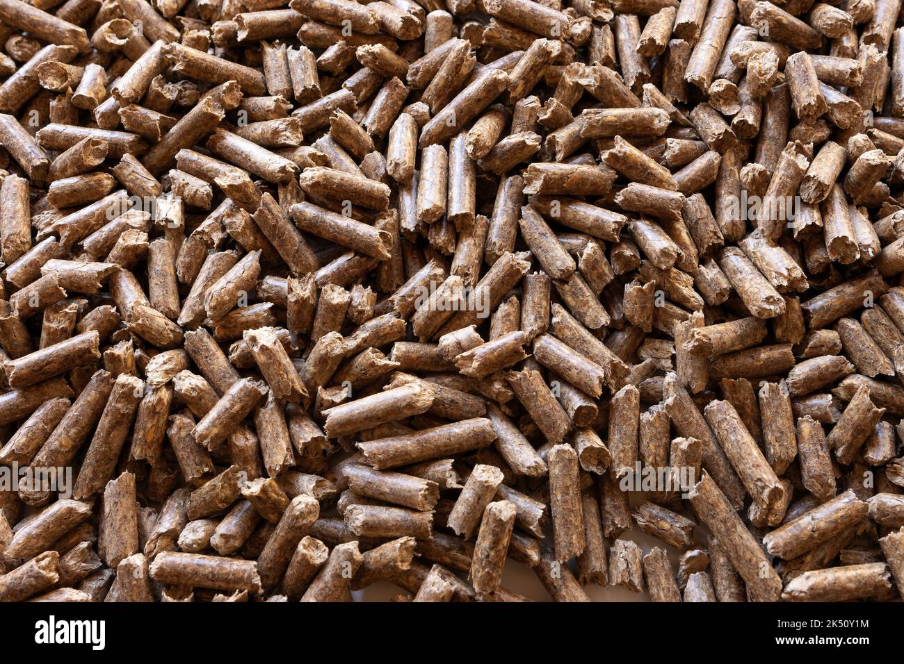 Isolated background of pellets, pressed wood as an alternative biomass