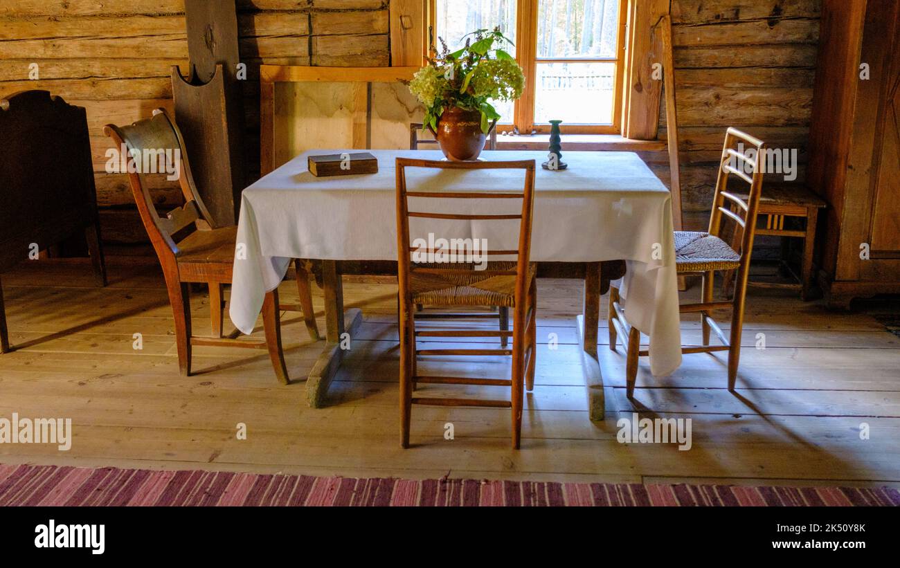 very old living room interior. minimal furniture, table, chairs Stock Photo Alamy