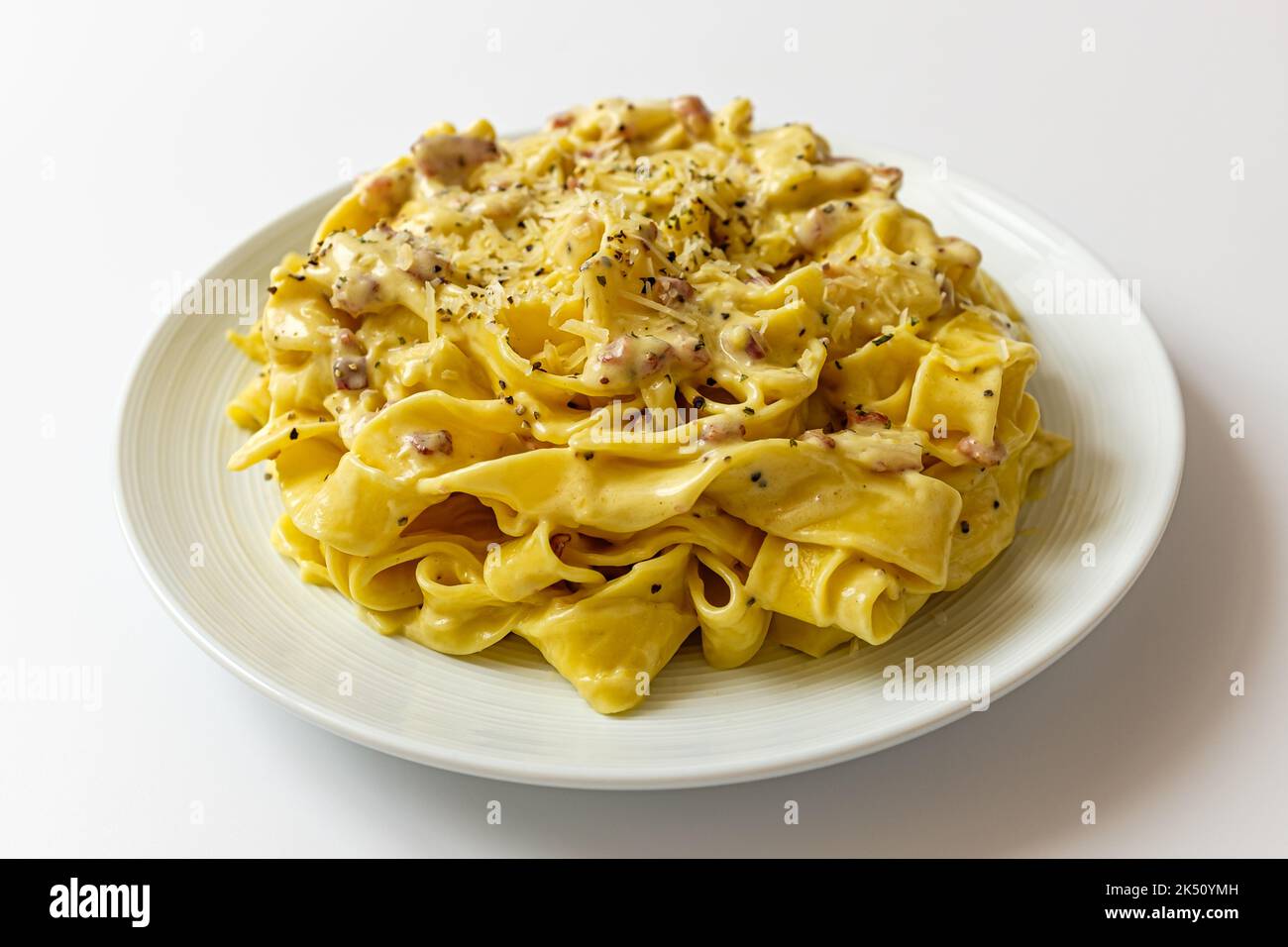 italian food culture. a type of pasta. Carbonara with Fettuccine Stock