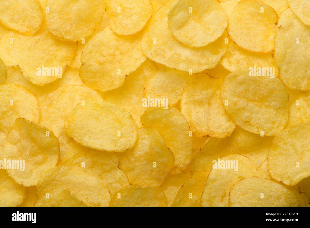 Natural potato chips texture top view pattern background Stock Photo