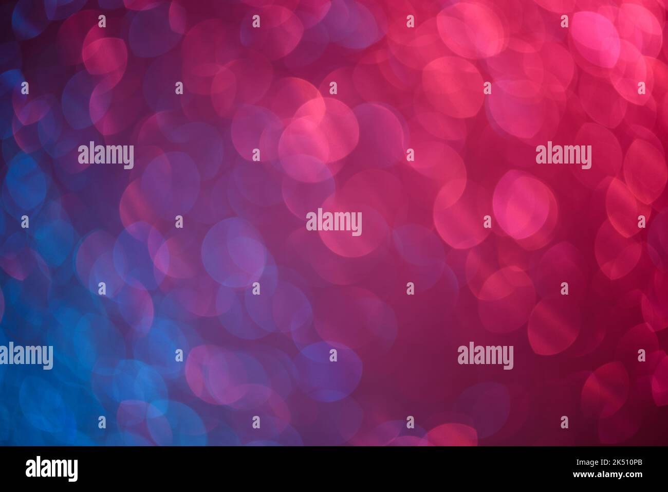 Blue and pink soft bokeh lights festive defocused abstract background Stock Photo