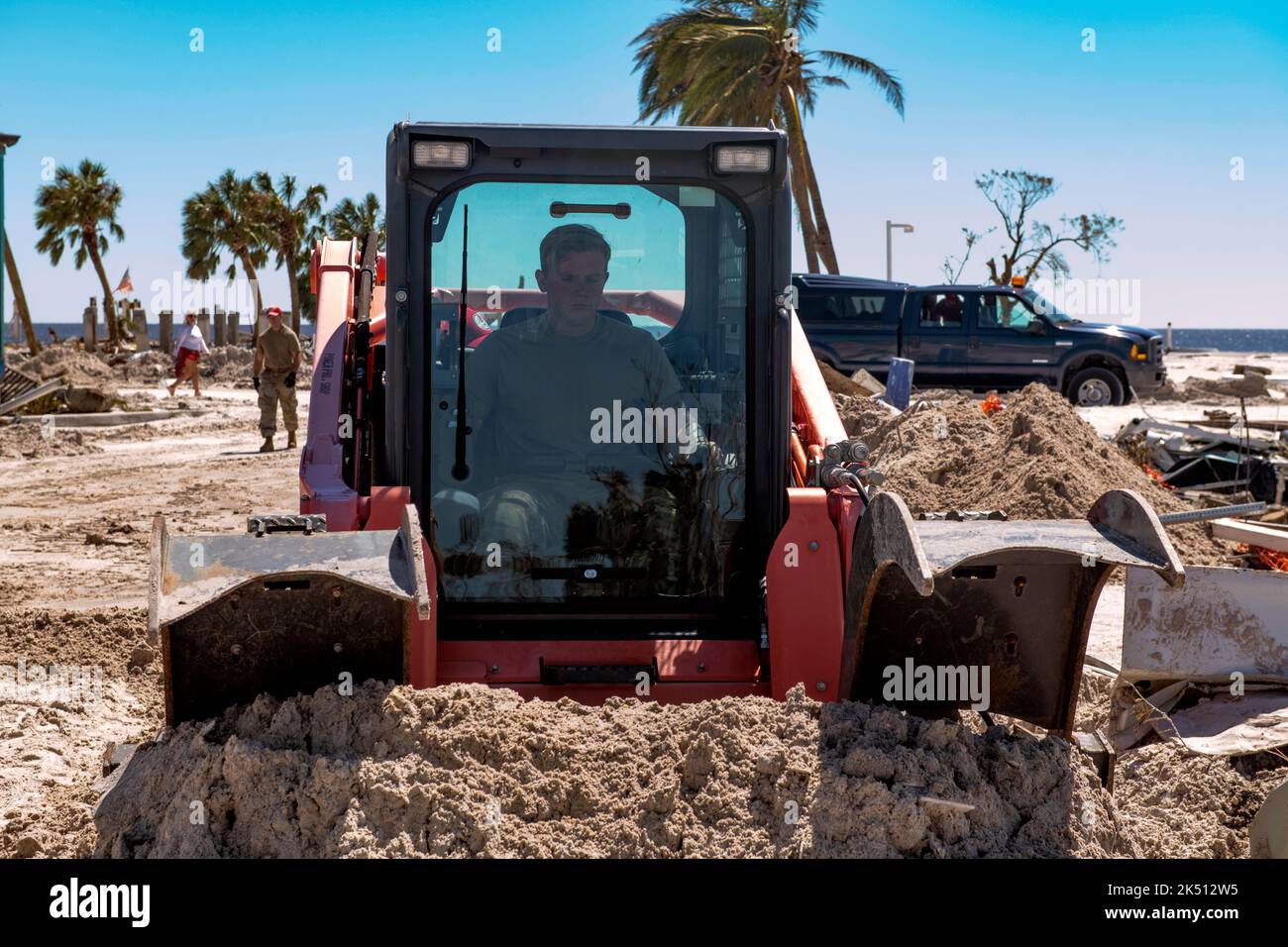 FORT MYERS BEACH, FLORIDA, USA - 30 September 2022 - The US Air National Guard 202nd RED HORSE Squadron clear roads in Fort Myers Beach, Florida in re Stock Photo