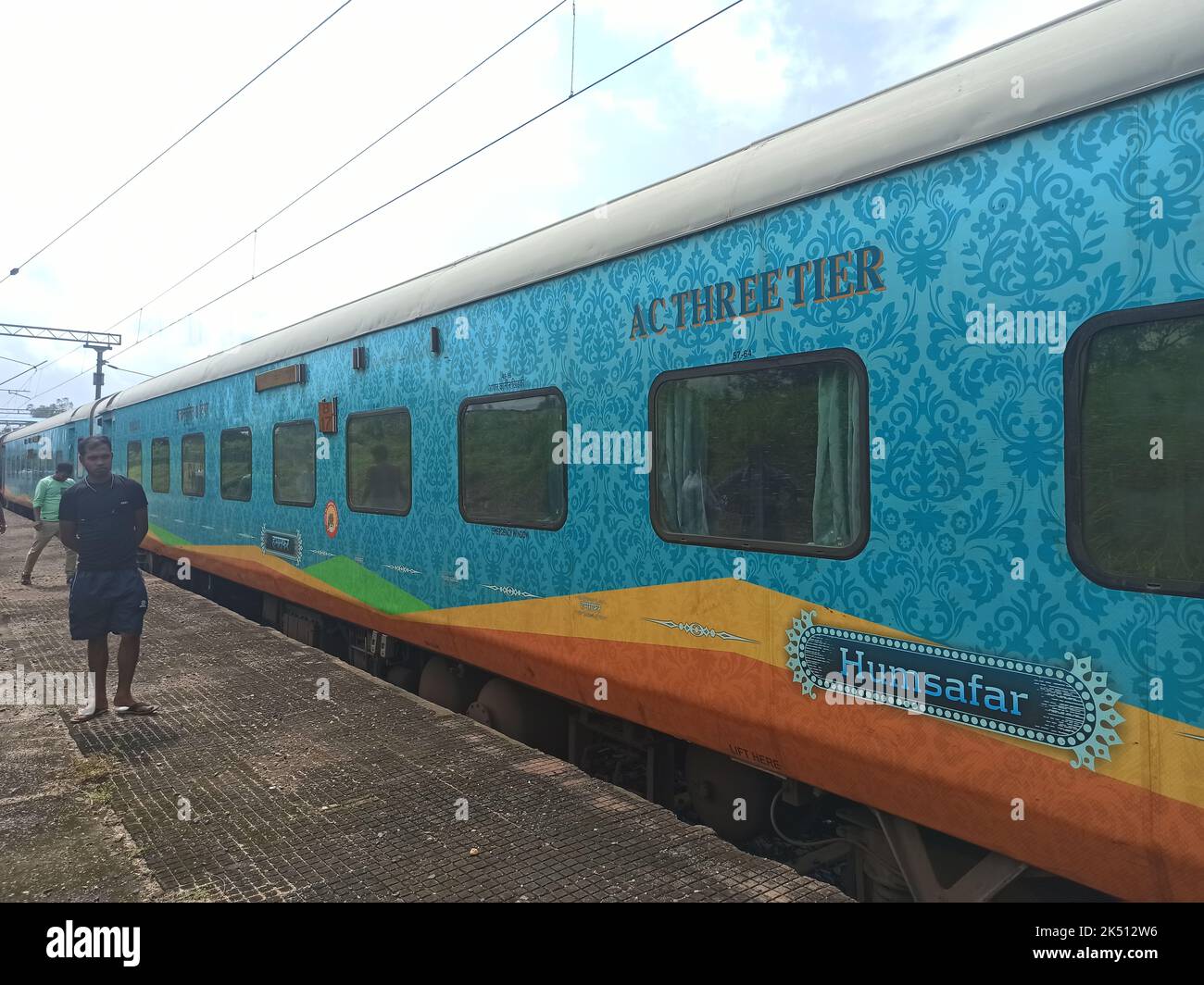 Humsafar Express standing at a platform. it is a fully premium service