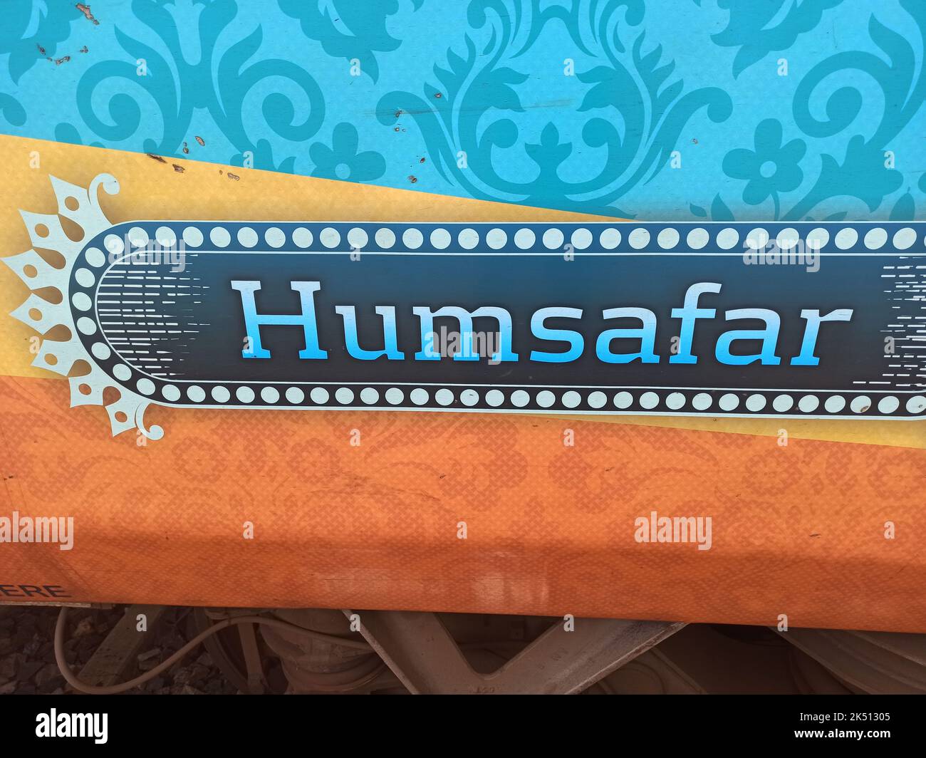 Humsafar Express standing at a platform. it is a fully premium service