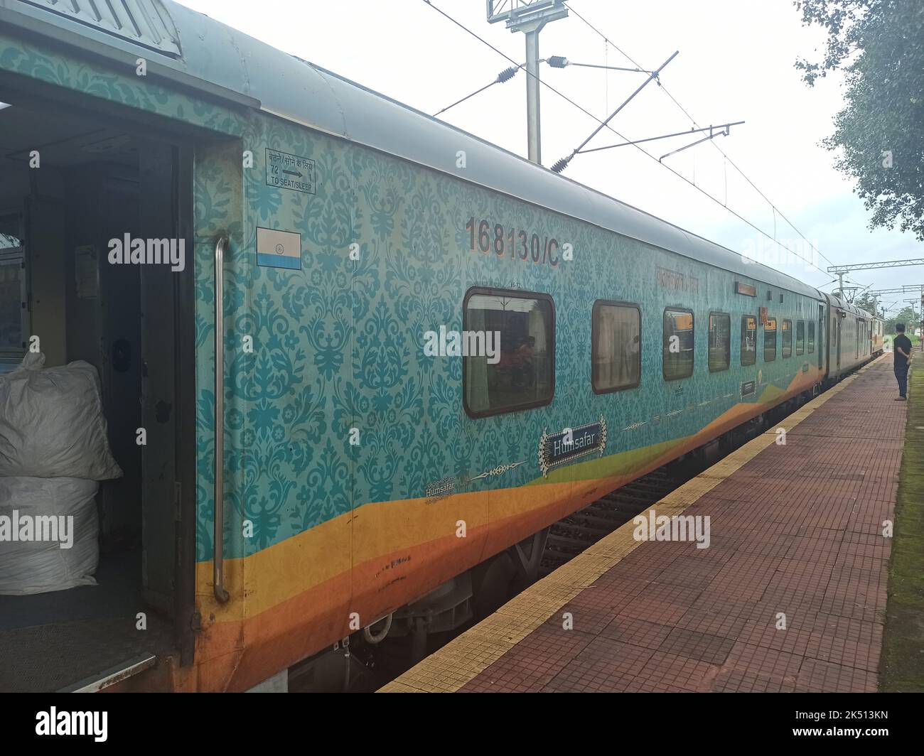 Humsafar Express standing at a platform. it is a fully premium service