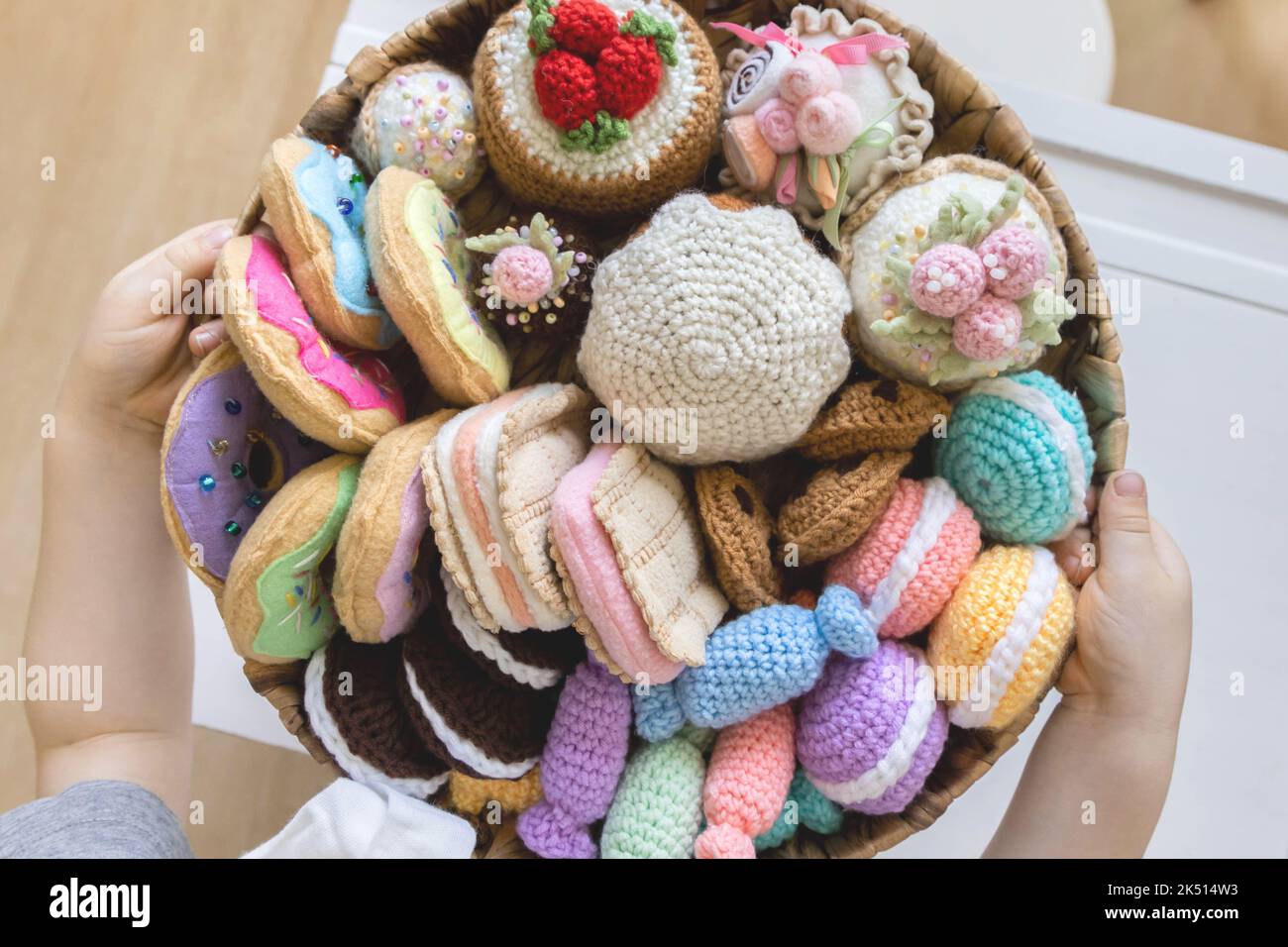 Toy food knitted from yarn. Sweets, pastries, cookies and cakes Stock ...