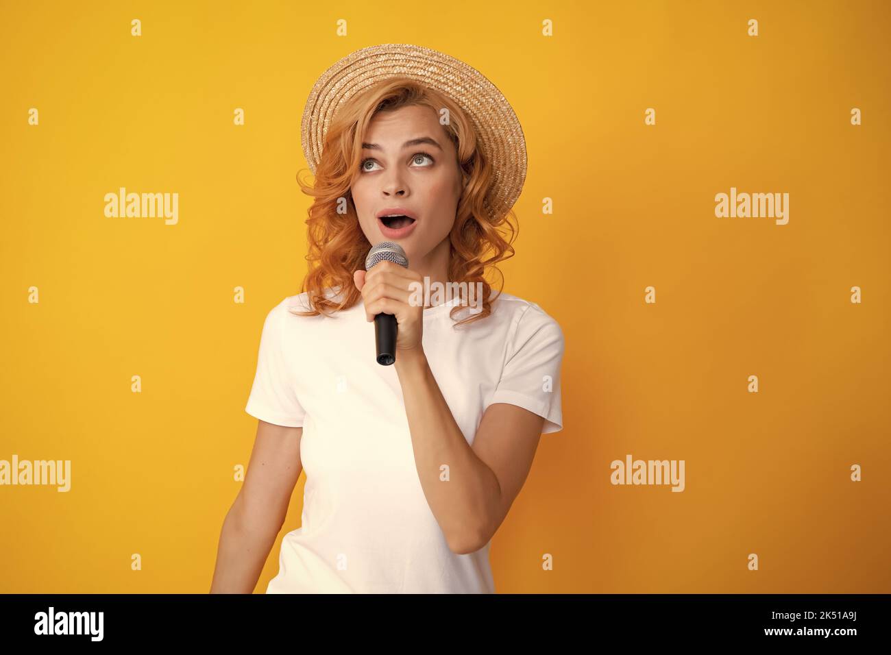 Microphone speech speaking concept. Young beautiful woman singing song