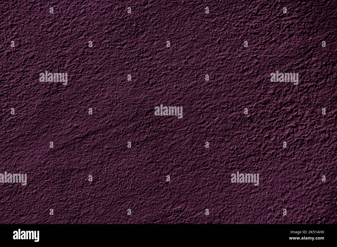 Wine red colored wall background with textures of different shades of