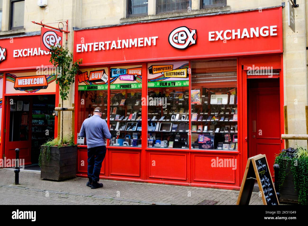High street shop fronts in Bath. CEX Entertainment Exchange Stock Photo