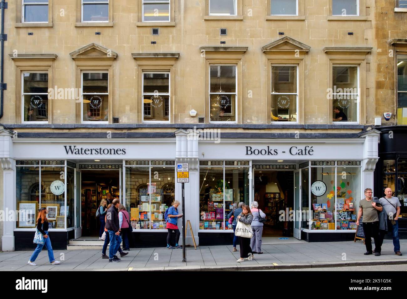 High street shop fronts in Bath. Waterstones cafe and book shop on Milsom st Stock Photo