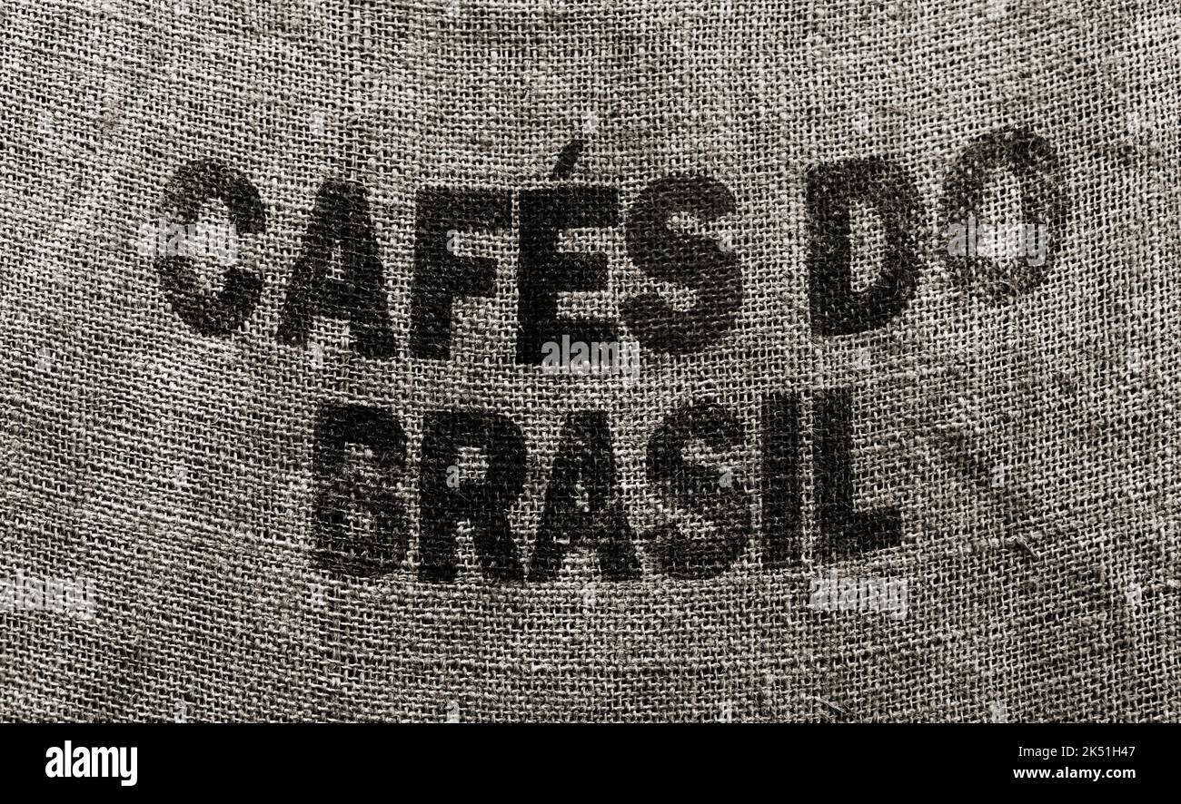 Jute bag background with standard marking Brazilian text: Cafes do Brasil. In English that means Brazilian Coffee Stock Photo