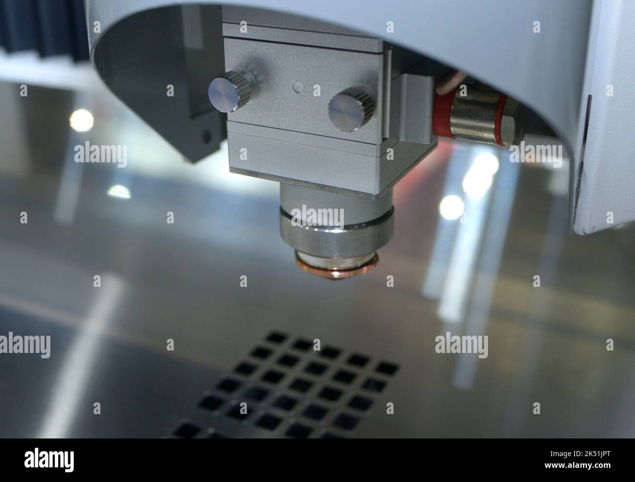 CNC plasma cutting machine working cut metal sheet. Stock Photo