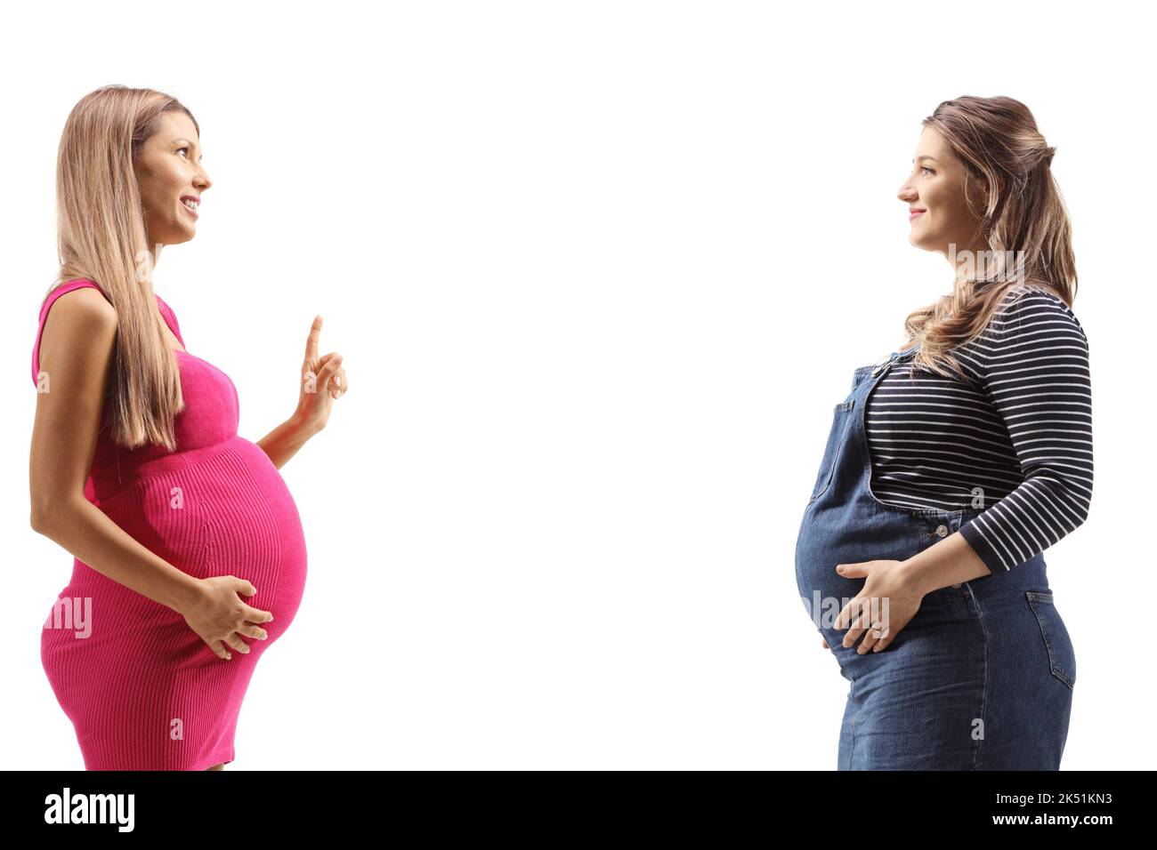 Pregnant women having a conversation isolated on white background Stock Photo