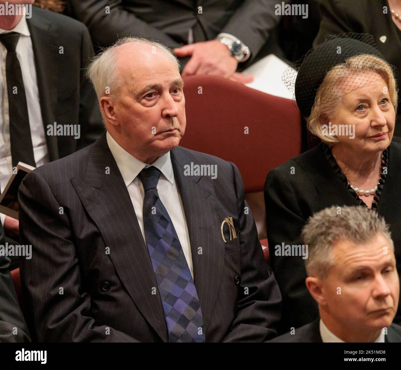 A closeup shot of Paul Keating at national memorial service to