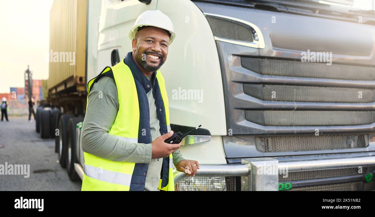 Construction worker in shipping business by delivery truck in shipyard