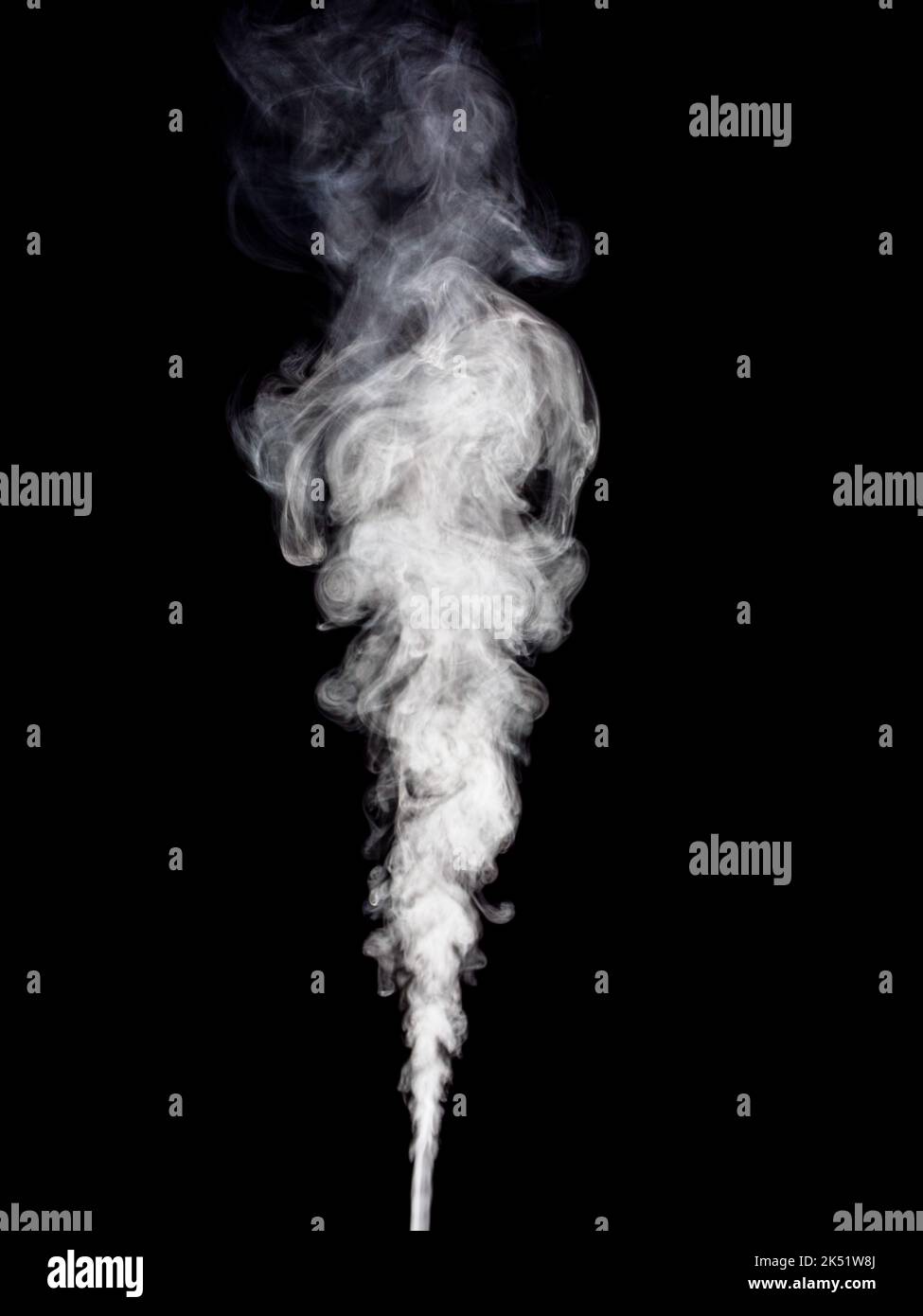 Wisp Smoke Rising Fluffy wisp of white smoke rises on black background Stock Photo - Alamy