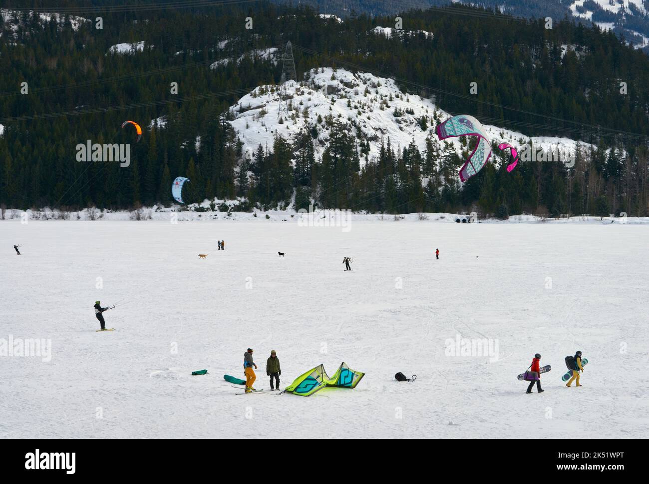 Whistler, British Columbia, Canada – March 2, 2019. Snow Kiting on Green Lake Whistler. Snow kiters on a windy day on frozen Green Lake in Whistler, B Stock Photo