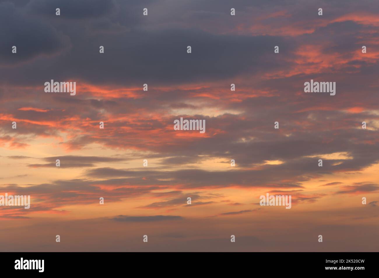 Twilight sky with clouds in the sunset for design your work nature backdrop. Stock Photo