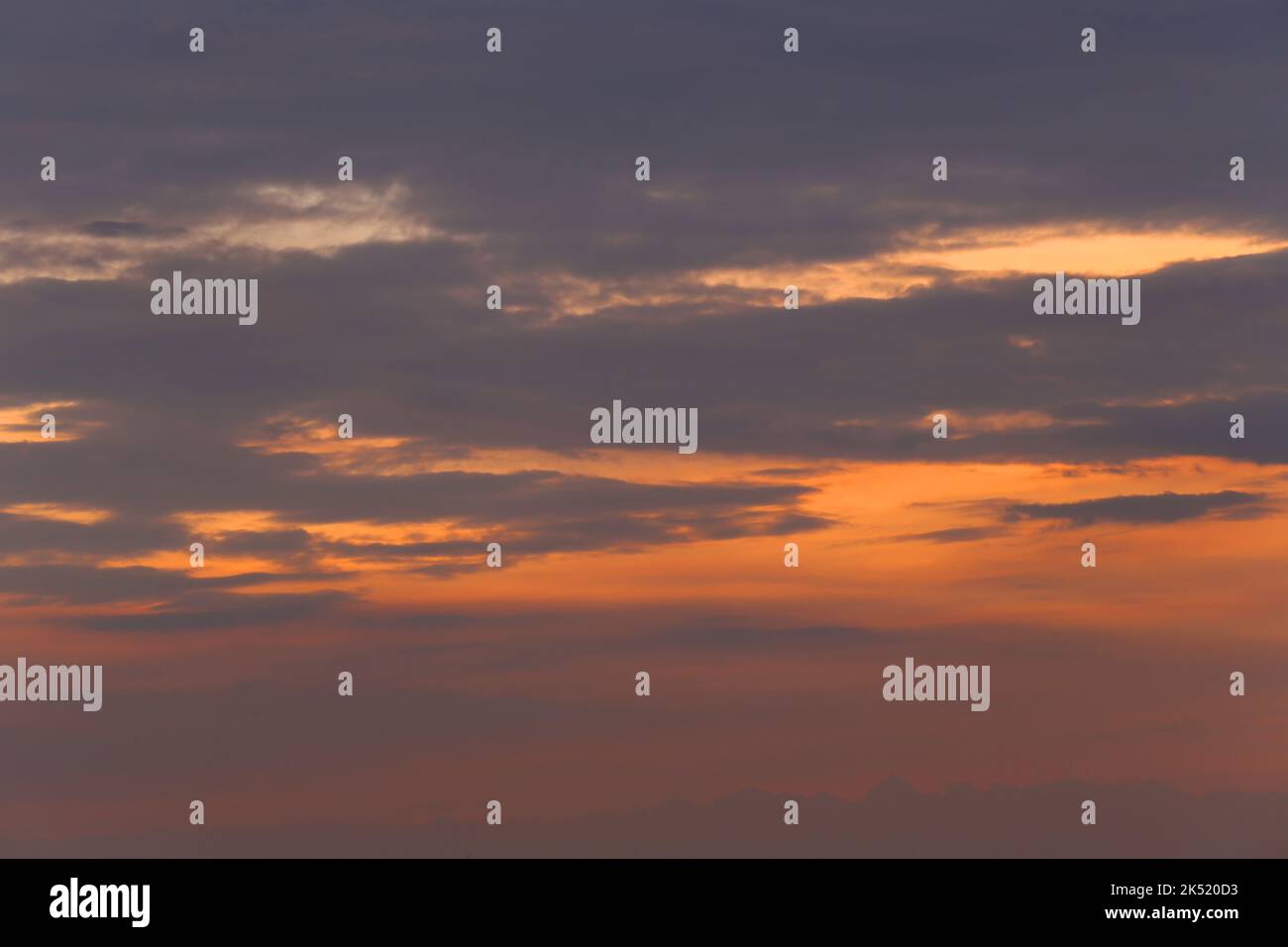 Twilight sky with clouds in the sunset for design your work nature backdrop. Stock Photo