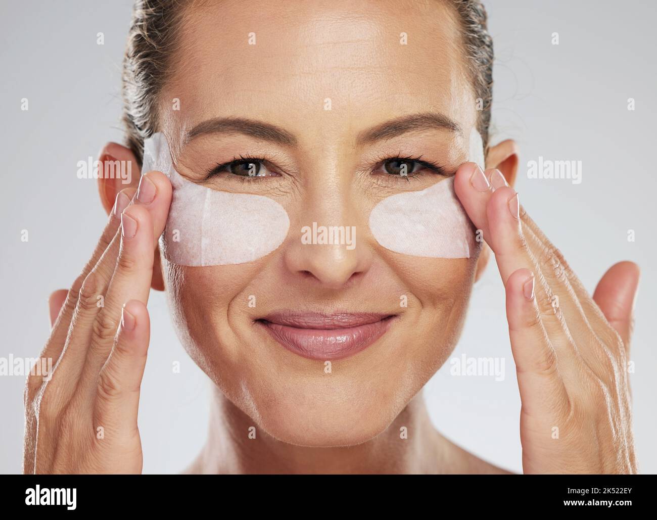 Eye wellness, skincare and mature woman with dermatology product for