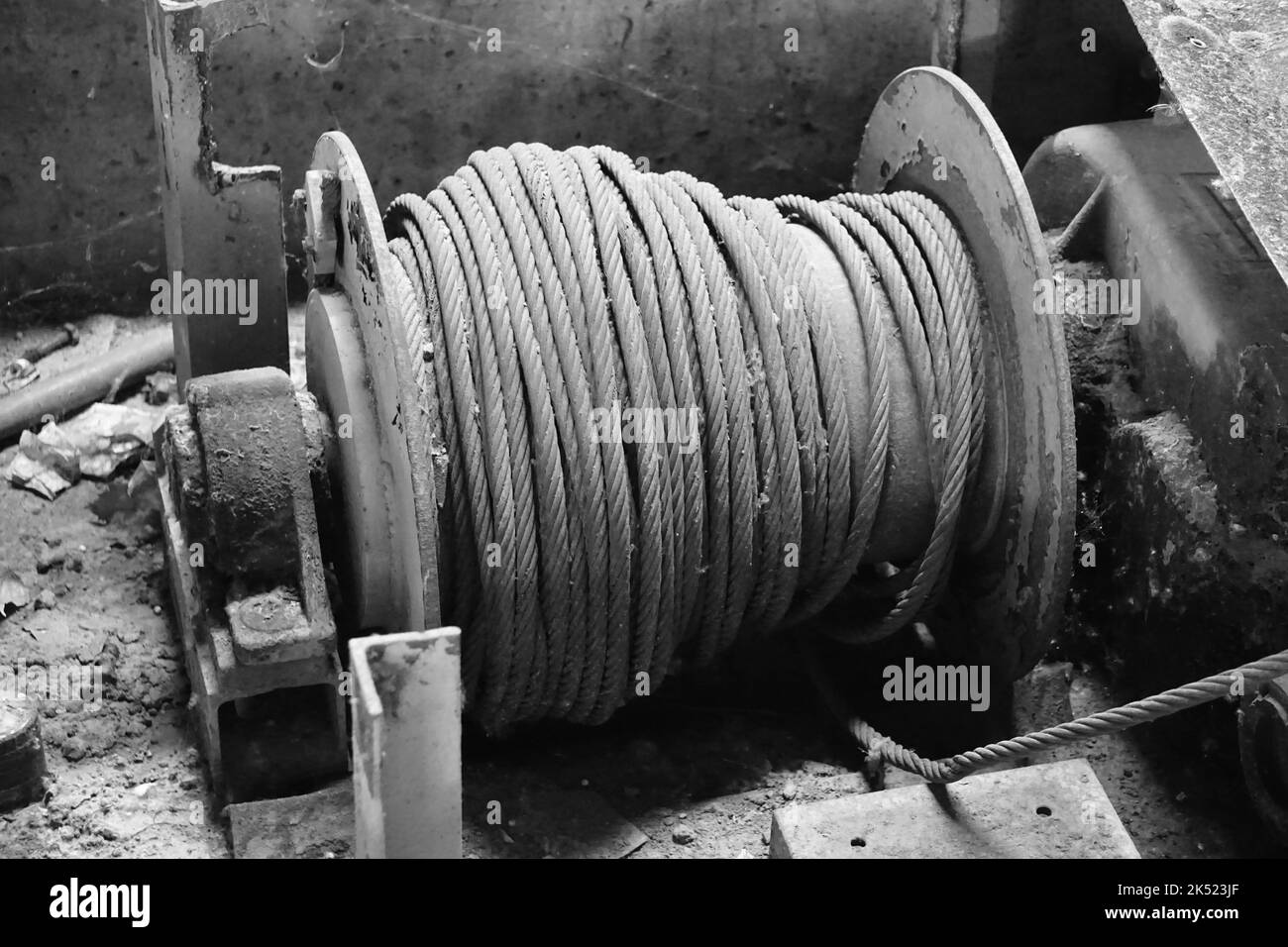 A grayscale shot of an old and dirty rope spool Stock Photo - Alamy