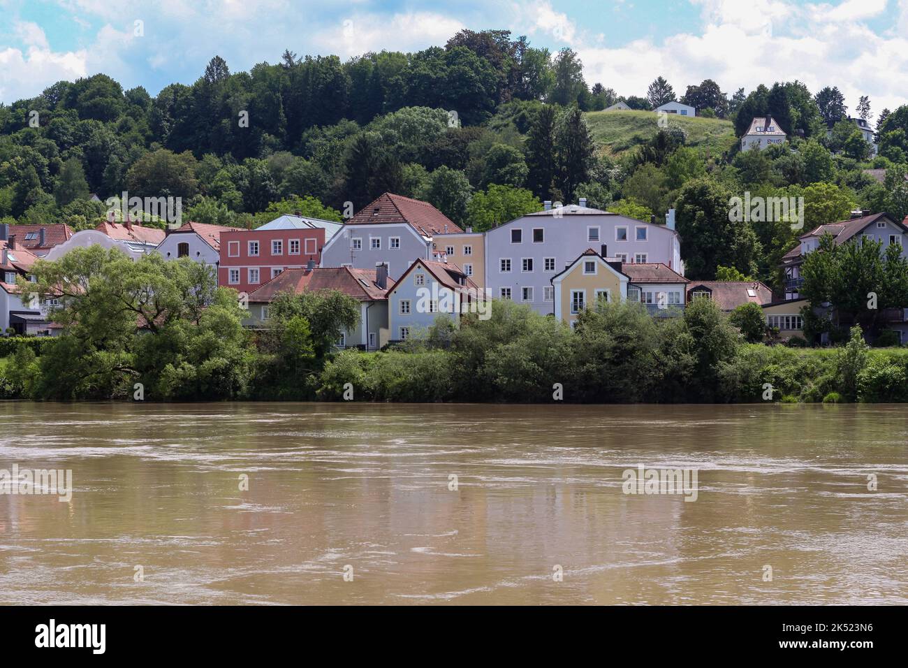 Colorful city silhouette of a district of Passau with the river Inn. Stock Photo