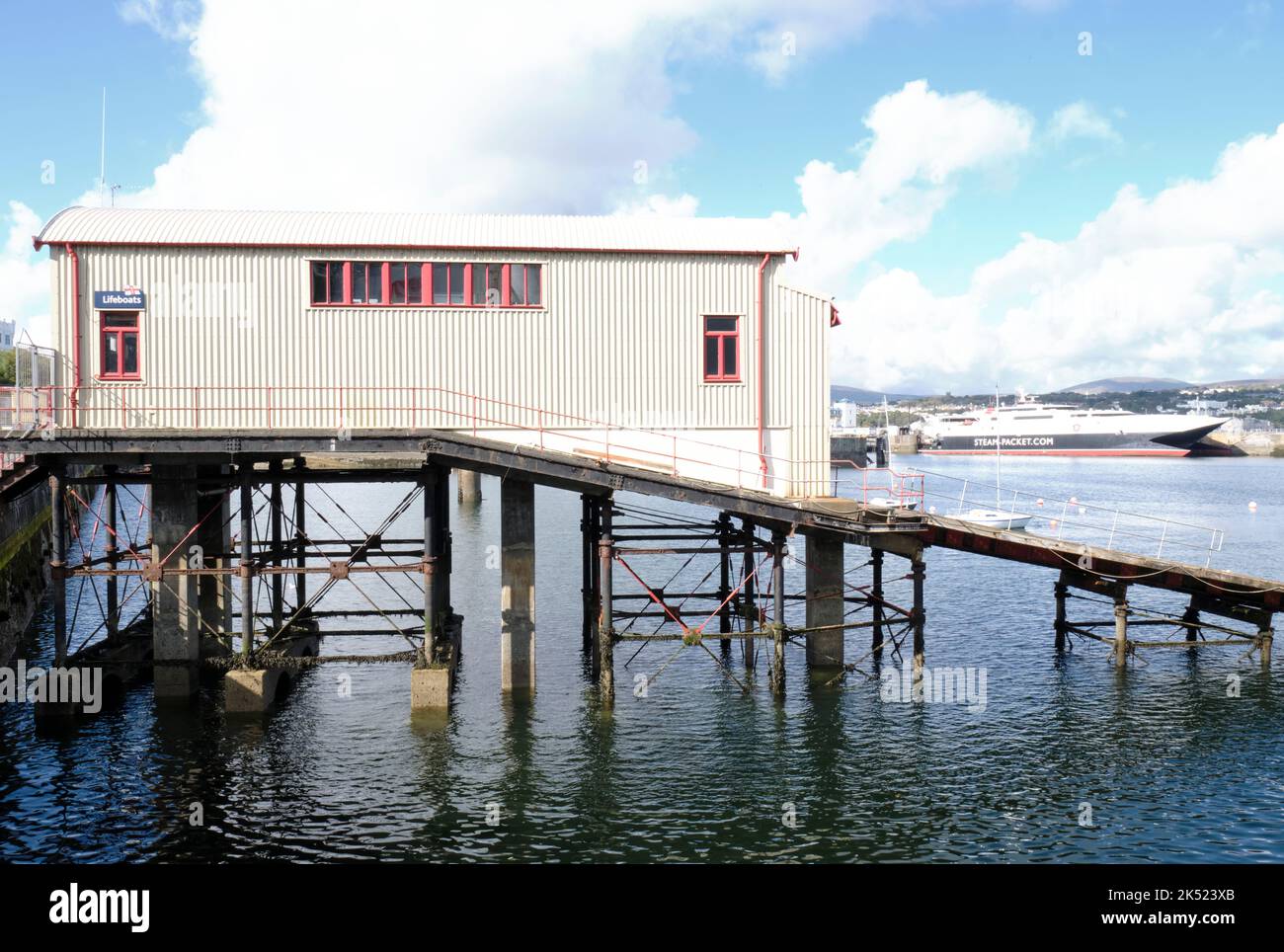 The lifeboat house in Douglas, Isle of Man with the ramp supported by rusting Stock Photo