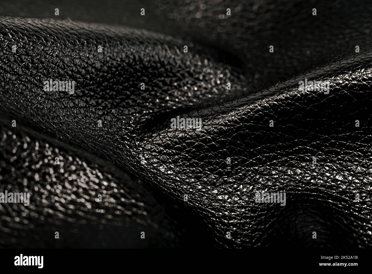 Black genuine leather texture. Leather background with folds and waves Stock Photo Alamy