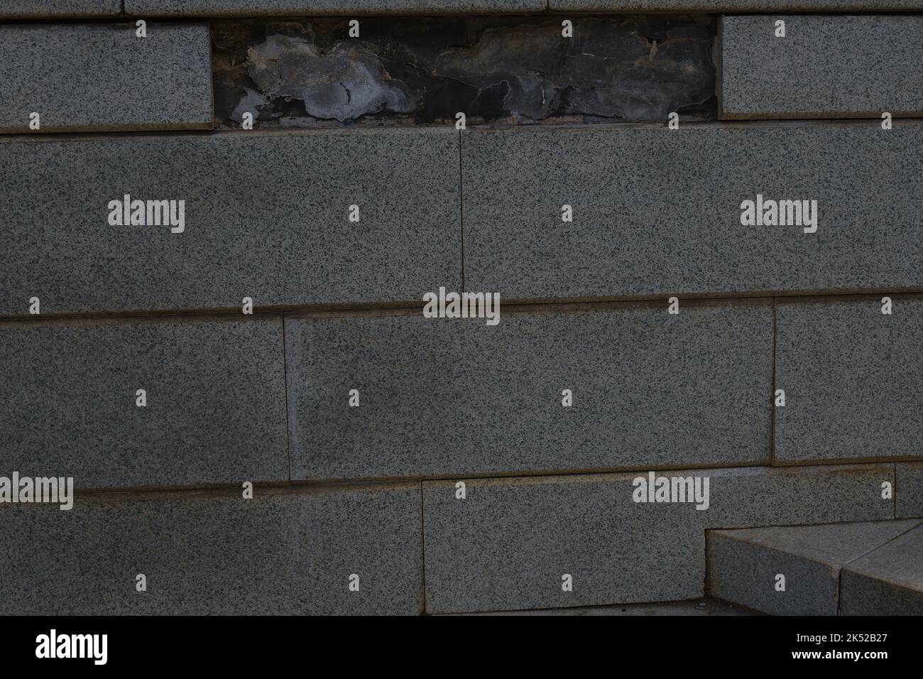 old marble stone walls texture from quarry with dirty stains and