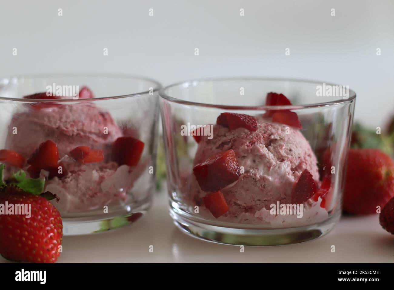 Scoops of Homemade strawberry ice cream. Three ingredient ice cream