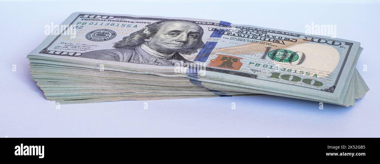 Pile of 100 dollar banknotes on white background for design purpose ...