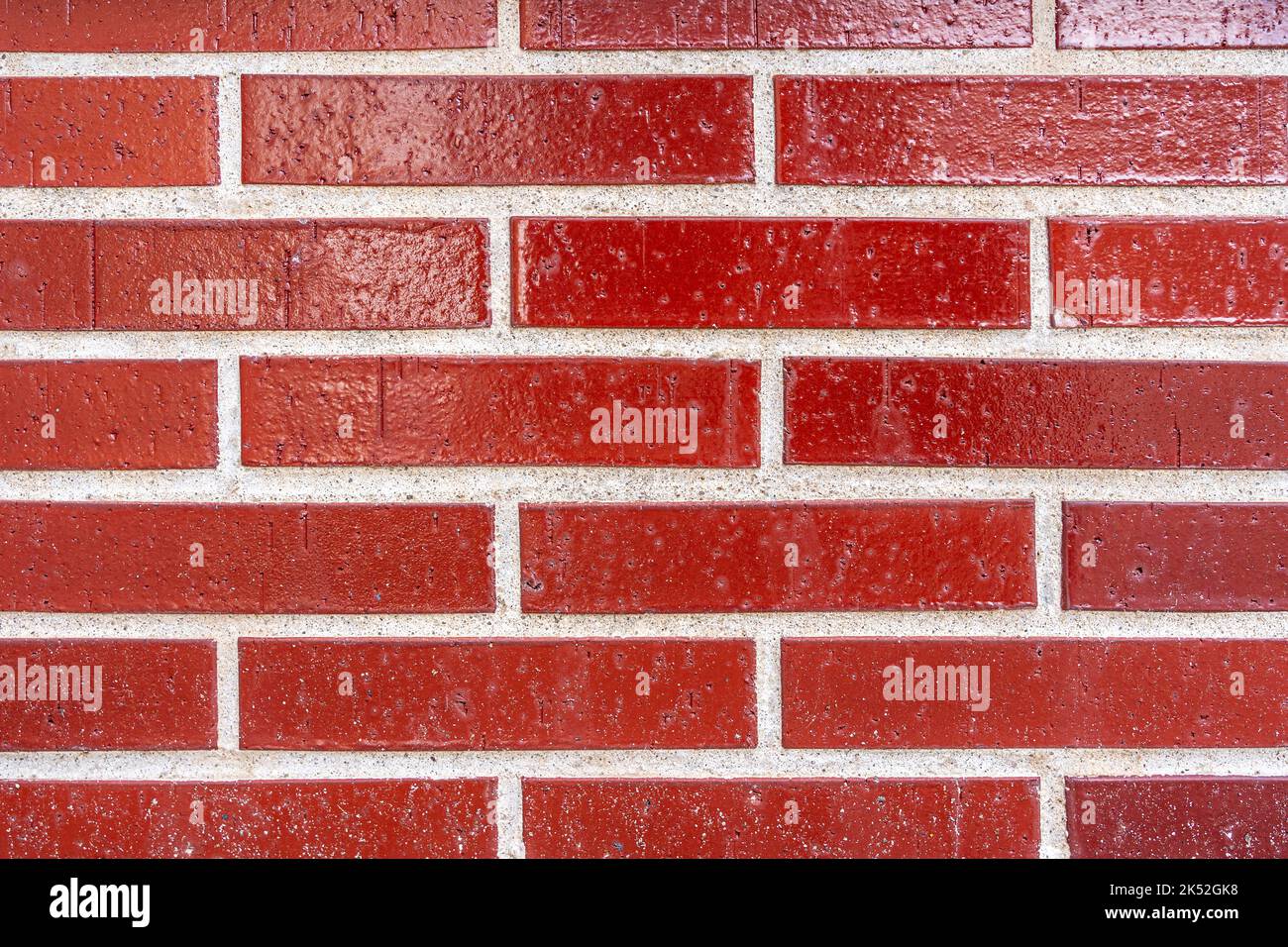 red vintage brick wall with decayed structure. Stock Photo