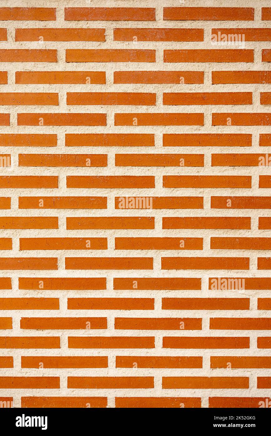 brown vintage brick wall with decayed structure. Stock Photo
