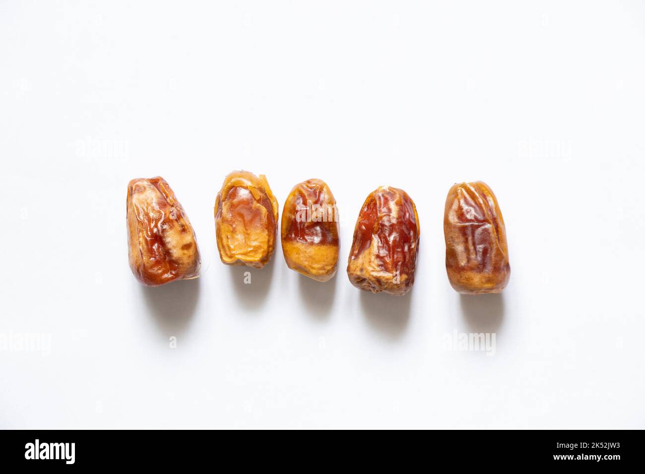 Dry date on a white background Egyptian closeup Stock Photo Alamy