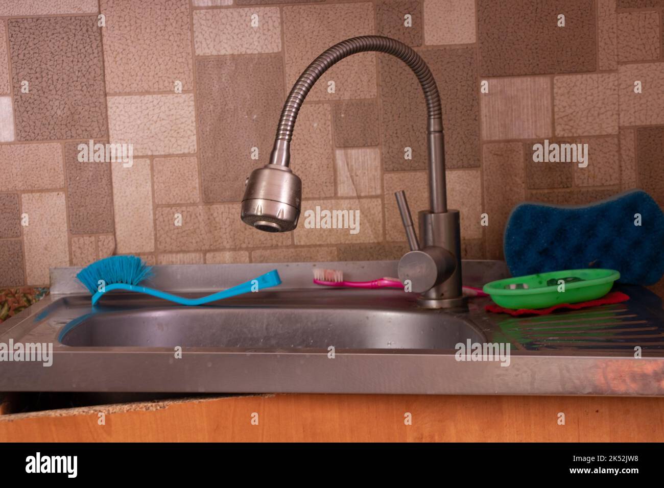 plumbing, disassembled kitchen faucet and mounting accessories Stock Photo  - Alamy