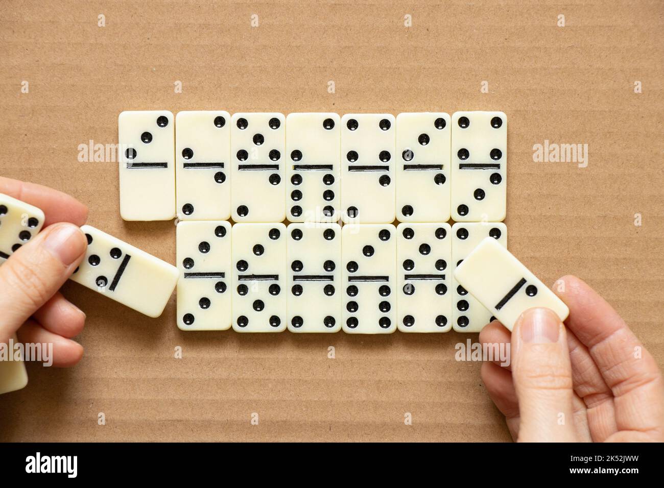 female hand playing dominoes,gambling and hobby Stock Photo