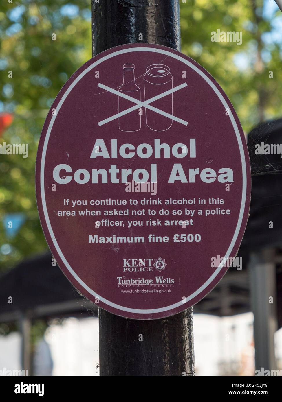 'Alcohol Control Area' warning sign on a lamp post in the Pantiles, Royal Tunbridge Wells, Kent, UK. Stock Photo
