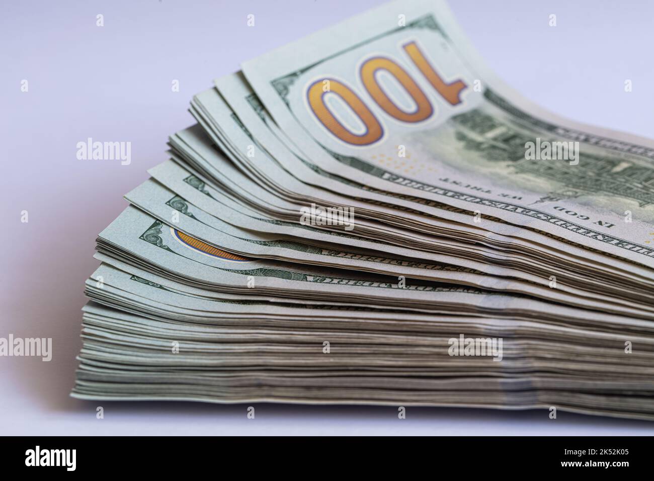 Pile of 100 dollar banknotes on white background for design purpose ...