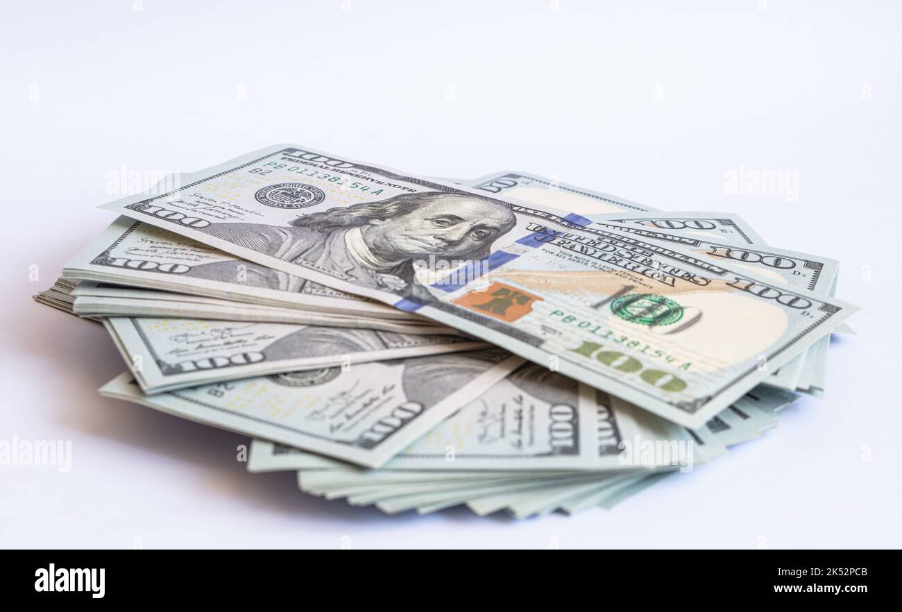 Pile of 100 dollar banknotes on white background for design purpose ...