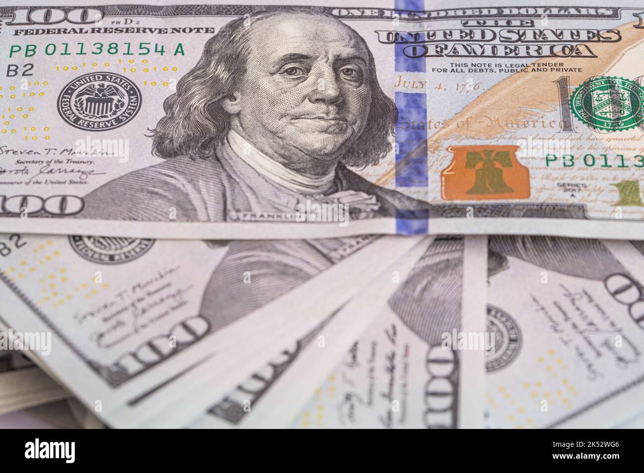Pile of 100 dollar banknotes on white background for design purpose ...