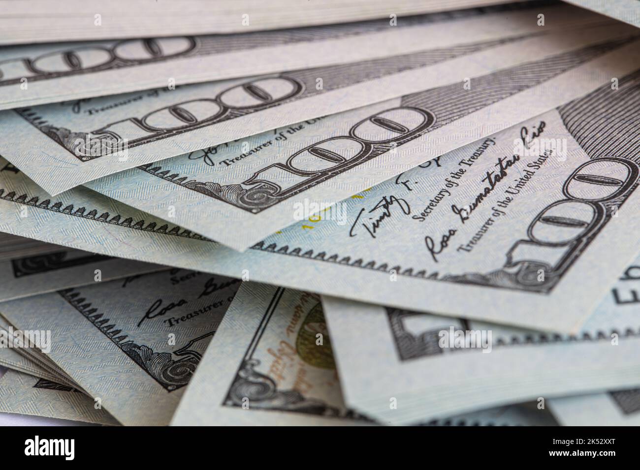Pile of 100 dollar banknotes on white background for design purpose ...
