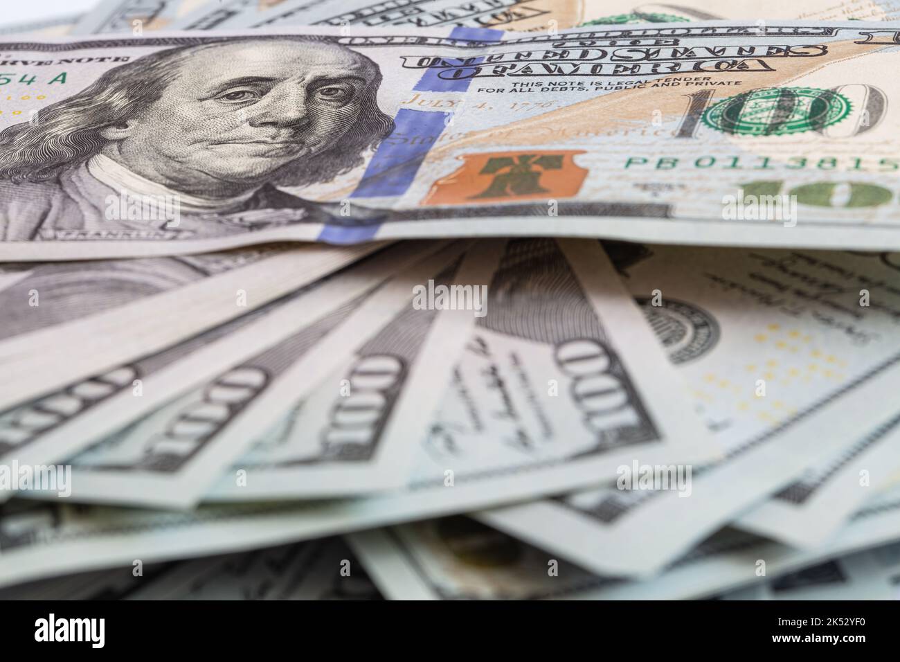 Pile of 100 dollar banknotes on white background for design purpose ...