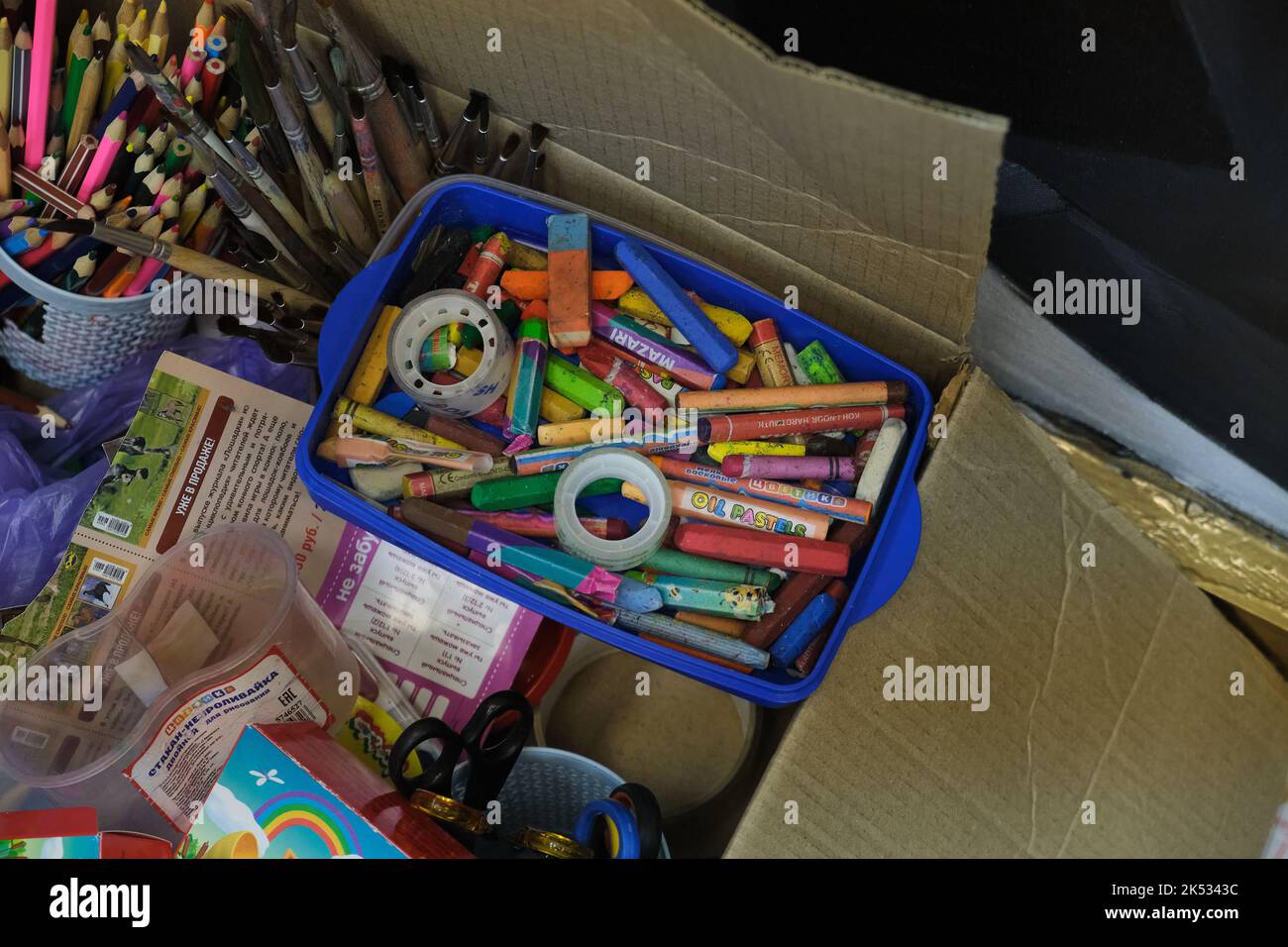 Colored pencils in a pencil case on box background Stock Photo