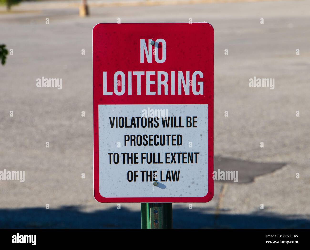 Red and White No Loitering Sign Stock Photo