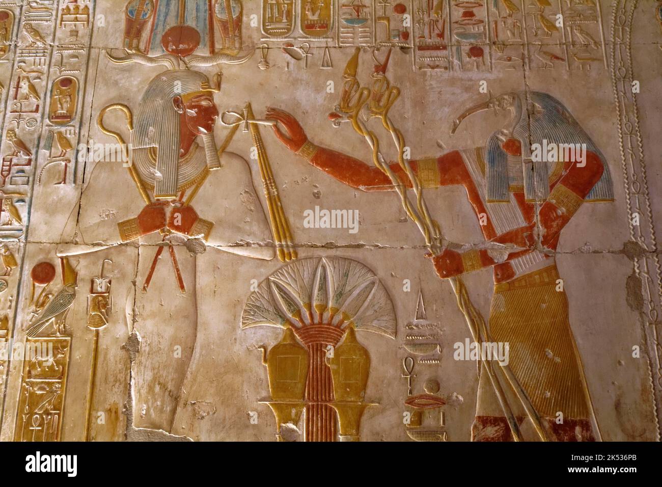 Egypt, Middle Egypt, Nile Valley, Abydos, temple of Seti 1, low relief showing the Ibis headed god Thoth praising god of the dead Osiris Stock Photo